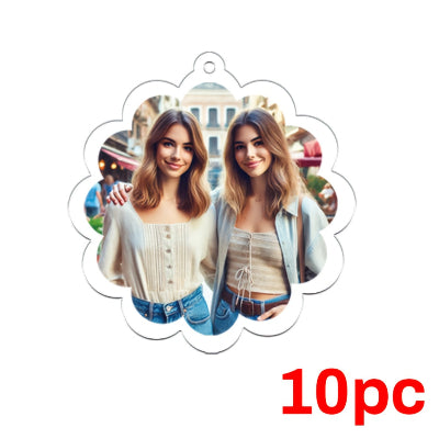 Decorative ornament with two people and '10pc' text on a white background